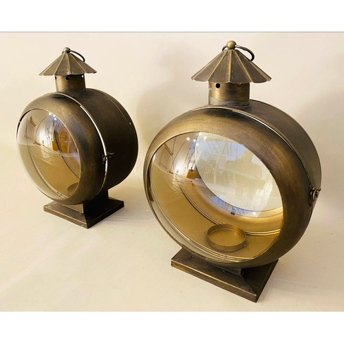 517 - LANTERNS, a pair, 54cm high x 37cm wide x 26cm deep, nautical style, antiqued gilt metal finish. (2)