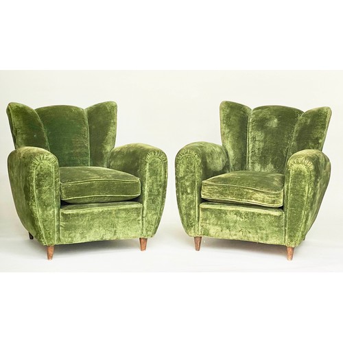 156 - WING ARMCHAIRS, a pair, green velvet upholstered with 'cloud' backs, rounded arms and tapering walnu... 