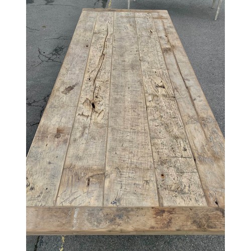 219 - FARMHOUSE DINING TABLE, plank top on cast metal base, 76cm x 91cm x 220cm.