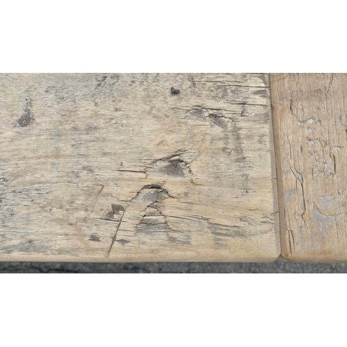 219 - FARMHOUSE DINING TABLE, plank top on cast metal base, 76cm x 91cm x 220cm.