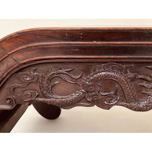 124 - CHINESE LOW TABLE/STOOL, 19th century Rosewood with scroll and carved side panels, 45cm D x 82cm W x... 