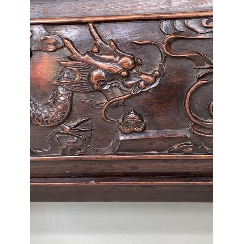 124 - CHINESE LOW TABLE/STOOL, 19th century Rosewood with scroll and carved side panels, 45cm D x 82cm W x... 