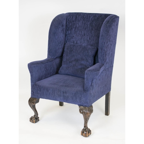 145 - WING ARMCHAIR, 106cm H x 75cm, early 20th century in navy blue chenille.