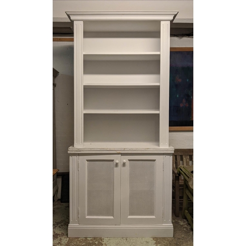 436 - BOOKCASE, 245cm H x 41cm x 107cm, painted finish with grilled doors.