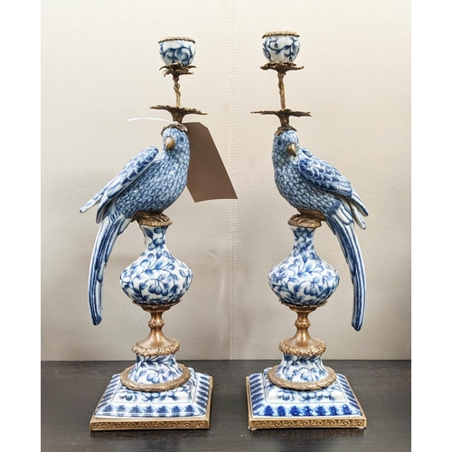 446 - CANDELABRA, a pair, 48cm H, in the form of cockatoos, blue and white ceramic, gilt metal mounts. (2)