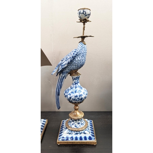 446 - CANDELABRA, a pair, 48cm H, in the form of cockatoos, blue and white ceramic, gilt metal mounts. (2)