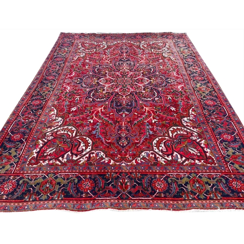 76 - PERSIAN HERIZ CARPET, 325cm x 230cm.