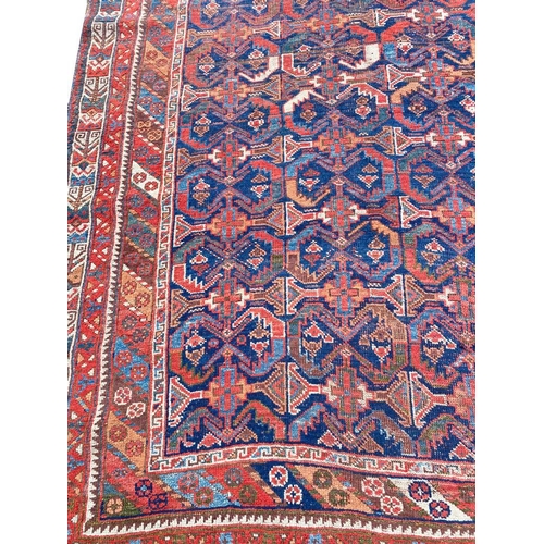 80 - ANTIQUE PERSIAN QASHQAI CARPET, 275cm x 150cm.