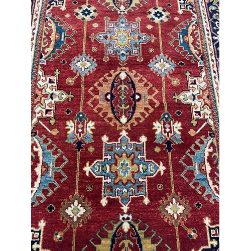 81 - CONTEMPORARY KARAJA RUG, 216cm x 152cm.