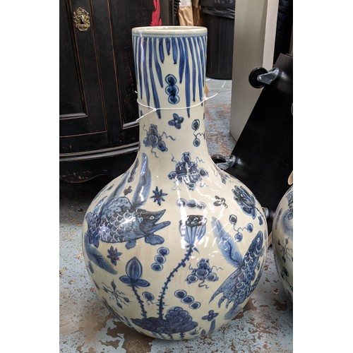 450 - BOTTLE VASES, a pair, 60cm H, Chinese Export style blue and white ceramic. (2)