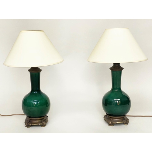 103 - TABLE LAMPS, a pair, Chinese emerald green ceramic and bronze mounted of gourd vase form with shades... 