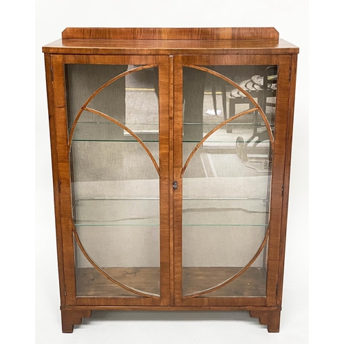 106 - ART DECO DISPLAY CABINET, walnut with two circular glazed doors enclosing shelves, 92cm x 131cm H x ... 