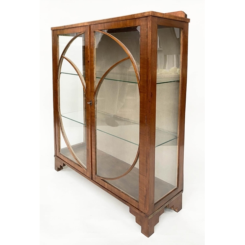 106 - ART DECO DISPLAY CABINET, walnut with two circular glazed doors enclosing shelves, 92cm x 131cm H x ... 