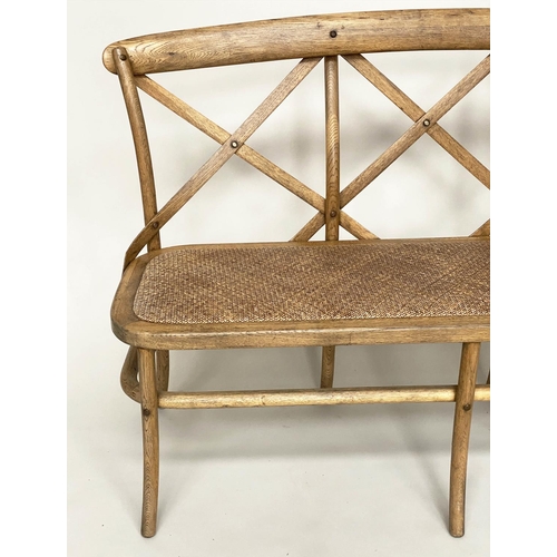 116 - HALL SEAT, Oka style ash bentwood with X lattice back and woven cane seat, 135cm W.