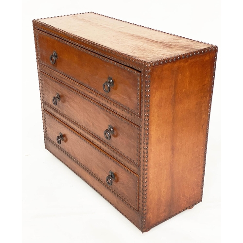 117 - LEATHER STUDDED CHEST, 1970's mid brown leather and brass studded with three long drawers and starbu... 