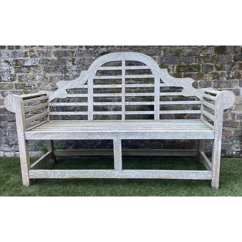 128 - LUTYENS STYLE GARDEN BENCH, weathered teak of slatted construction, 165cm W.