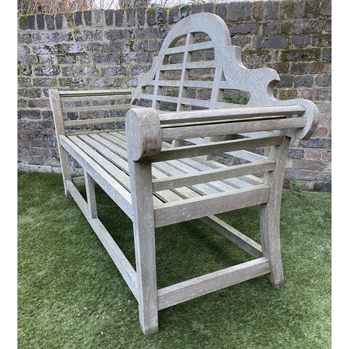 128 - LUTYENS STYLE GARDEN BENCH, weathered teak of slatted construction, 165cm W.