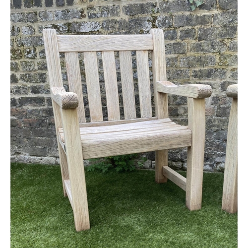 131 - GARDEN ARMCHAIRS, a pair, silvery weathered teak of substantial construction, 68cm W. (2)