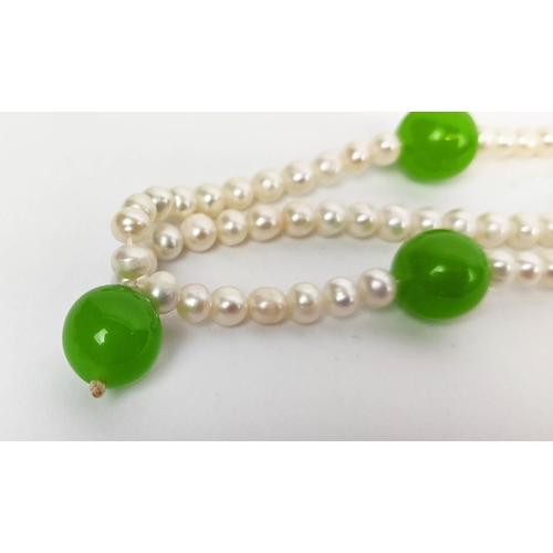 26 - TWO FRESHWATER PEARL AND DYED SIMULATED JADE NECKLACE, BRACELET AND EARRING SETS, the green jade set... 