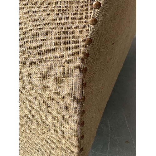 184 - SOFA, beige leather and studded linen hessian with turned front supports and outswept arms, 200cm W ... 