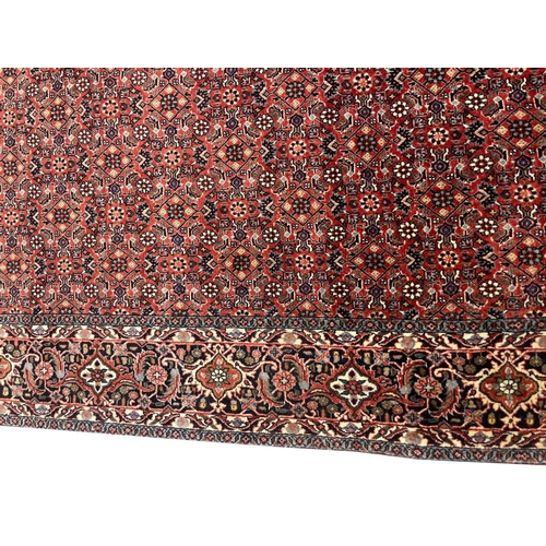 69 - PERSIAN MAHI DESIGN CARPET, 295cm x 200cm.