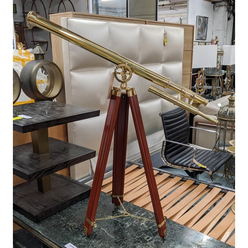 400 - TELESCOPE ON STAND, on height adjustable tripod stand, 198cm H at tallest.