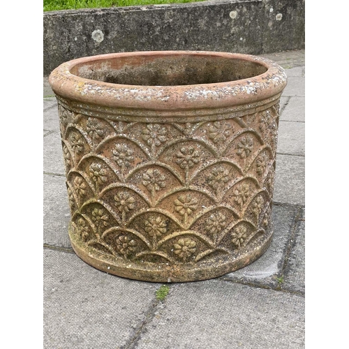 127 - GARDEN PLANTERS, a pair, weathered terracotta with flower motif, 50cm W. (2)