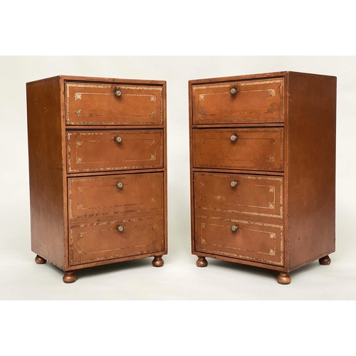 130 - FILING CHESTS, a pair, 1970's gilt tooled tan leather clad each with two fall front pullout drawers ... 