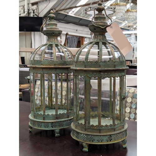 413 - STORM LANTERNS, a pair, Regency style, faux verdigris finish, 72cm H. (2)