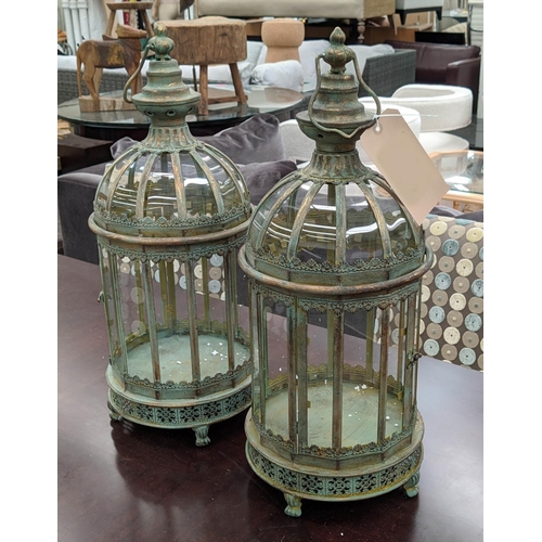 413 - STORM LANTERNS, a pair, Regency style, faux verdigris finish, 72cm H. (2)