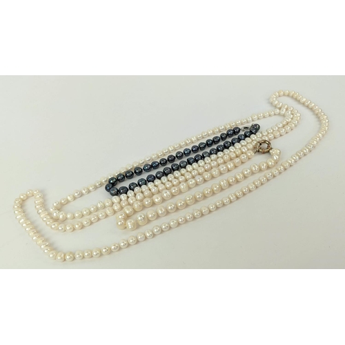 4 - FOUR FRESHWATER PEARL NECKLACES, comprising three white pearl necklaces and one peacock pearl neckla... 