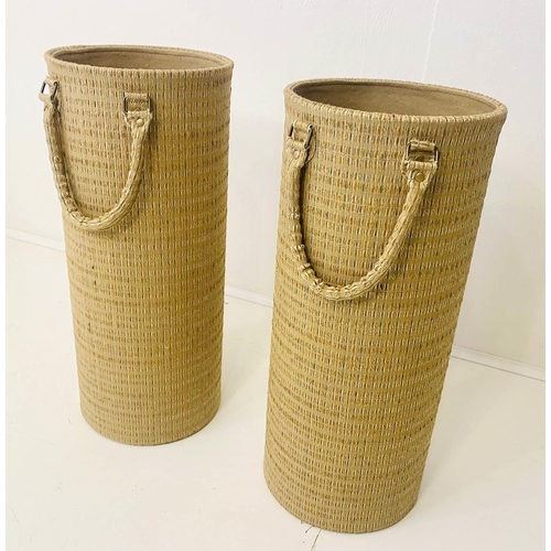 414 - UMBRELLA STANDS, a pair, 60cm x 26cm diam., thick woven fabric upholstered, with handles. (2)