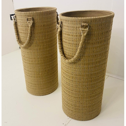 414 - UMBRELLA STANDS, a pair, 60cm x 26cm diam., thick woven fabric upholstered, with handles. (2)