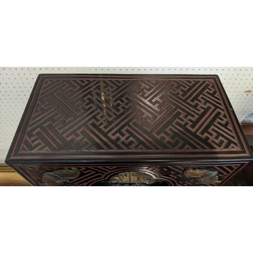 20 - CHINESE COMPARTMENTALISED LACQUERED BOX ON STAND, in four sections, incised decoration with metal ba... 