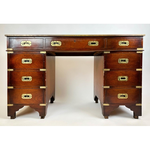 143 - PEDESTAL DESK, Campaign style mahogany with brass mounts and nine drawers, 75cm H x 122cm x 54cm.