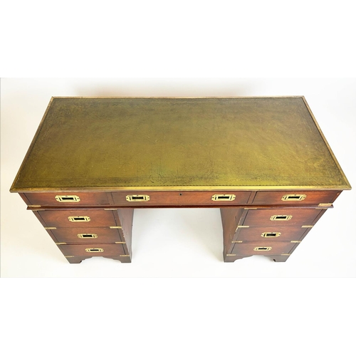 143 - PEDESTAL DESK, Campaign style mahogany with brass mounts and nine drawers, 75cm H x 122cm x 54cm.