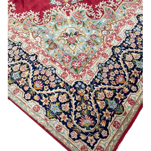 61 - FINE PERSIAN KIRMAN CARPET, 387cm x 295cm.