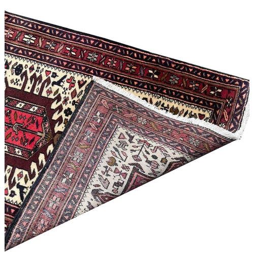 69 - PERSIAN KARAJA RUNNER, 345cm x 76cm.