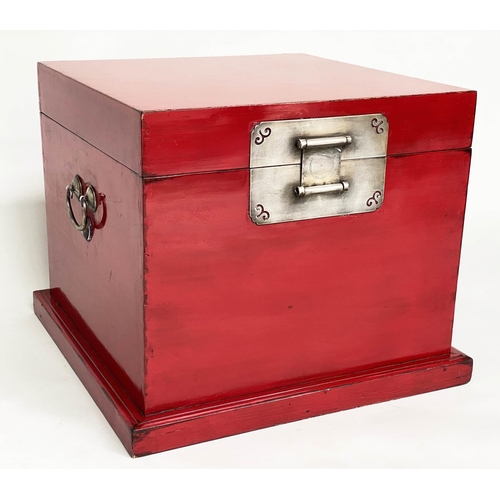 91 - TRUNK, early 20th century Chinese scarlet lacquer and silvered metal mounted with plinth and carryin... 