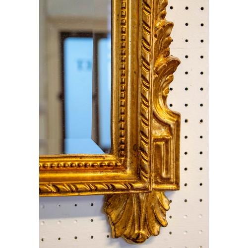 121 - WALL MIRROR, 128cm H x 75cm W, Louis XVI style, gilt framed with urn crest.