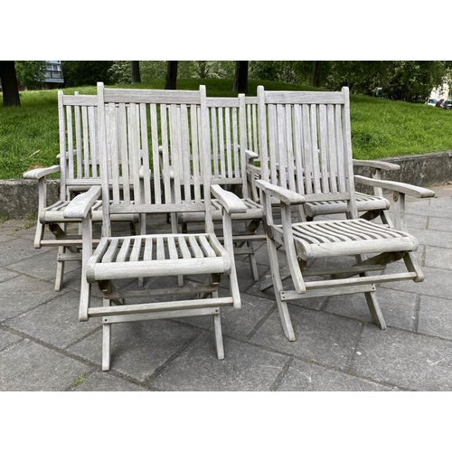 120 - GARDEN EXTENDING TABLE AND CHAIRS, silvery weathered teak, slatted construction rounded rectangular ... 