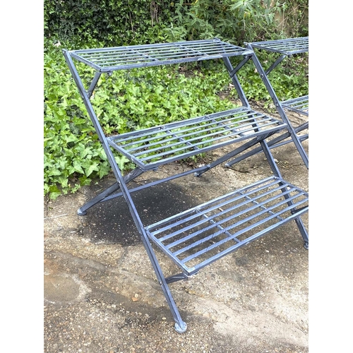 433 - GARDEN ETAGERES, 59cm H x 69cm W x 69cm D, a pair, three tier, lead grey painted metal. (2)