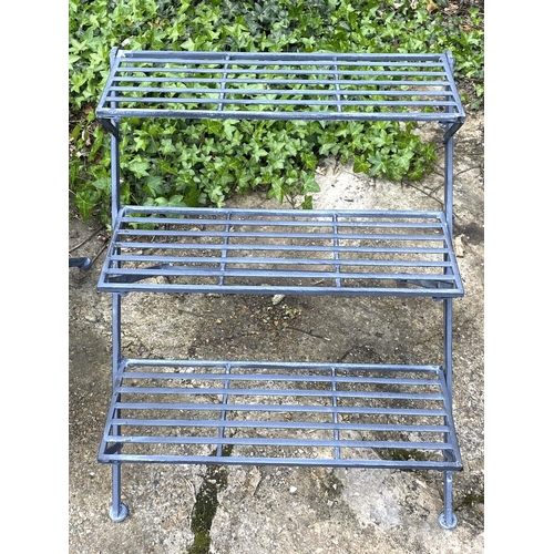 433 - GARDEN ETAGERES, 59cm H x 69cm W x 69cm D, a pair, three tier, lead grey painted metal. (2)