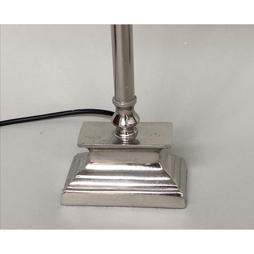 413 - CANDLESTICK TABLE LAMPS, Italian style chromium metal with stepped plinths and shades, 50cm H. (2)