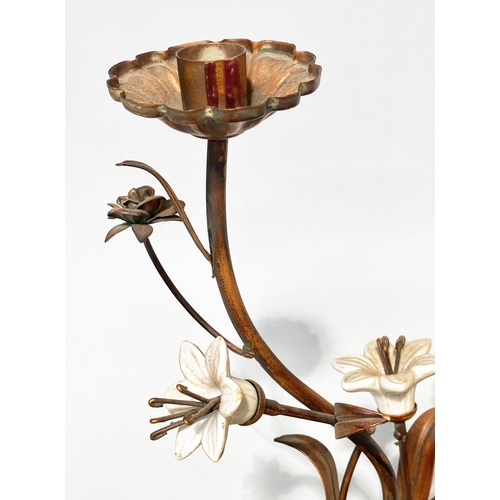 244 - FLOWER CANDLESTICKS, a pair, Italian style cast bronzed metal with ceramic flower heads, 40cm H. (2)