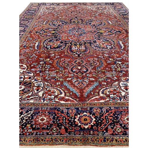 110 - ANTIQUE PERSIAN HERIZ CARPET, 380cm x 300cm.