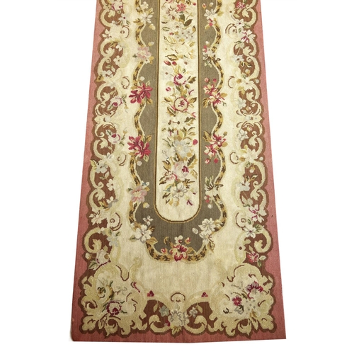 111 - AUBUSSON SAVONNERIE DESIGN NEEDLEPOINT RUNNER, 291cm x 65cm.