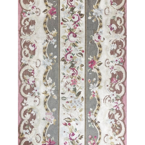 111 - AUBUSSON SAVONNERIE DESIGN NEEDLEPOINT RUNNER, 291cm x 65cm.