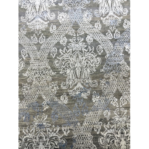 115 - FINE CONTEMPORARY ABSTRACT SILK AND WOOL CARPET,  309cm x 246cm.