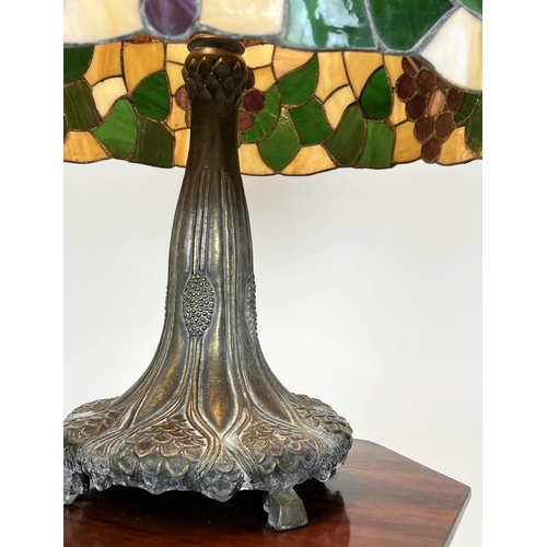 133 - TIFFANY STYLE LAMP, the shade decorated with grapes and vine leaves on an Art Nouveau design base, 6... 